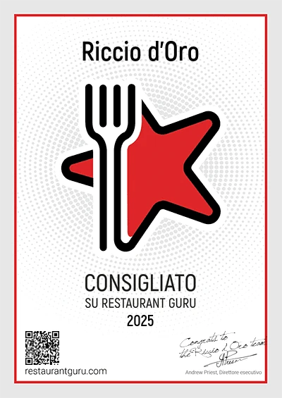 Certificate featuring a red star and fork symbol, recommending "Riccio d'Oro" on Restaurant Guru for 2025.